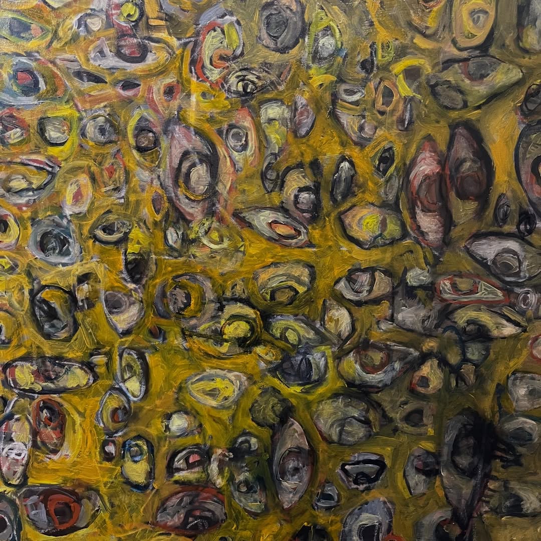 Abstract composition of looping, face-like forms in yellow, grey, pink and charcoal.